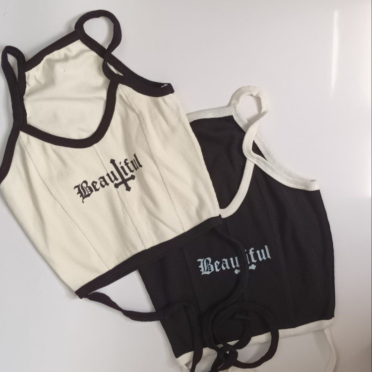 کراپ تاپ دخترانه با بند بلندی که دور کمر مدل میده